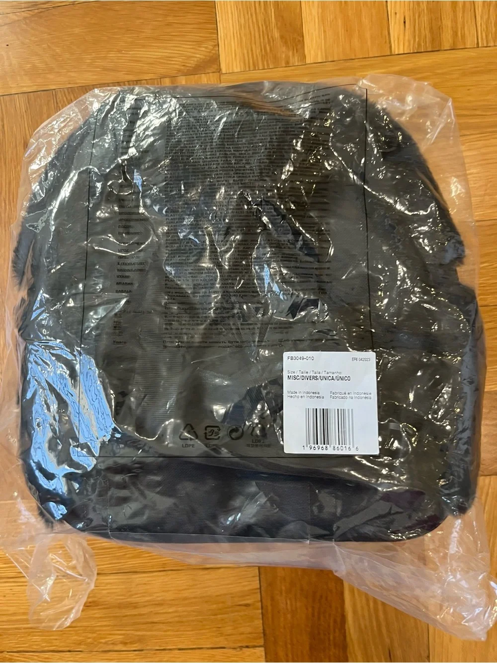 Nike Black Mini backpack faux fur with White Swoosh Accent